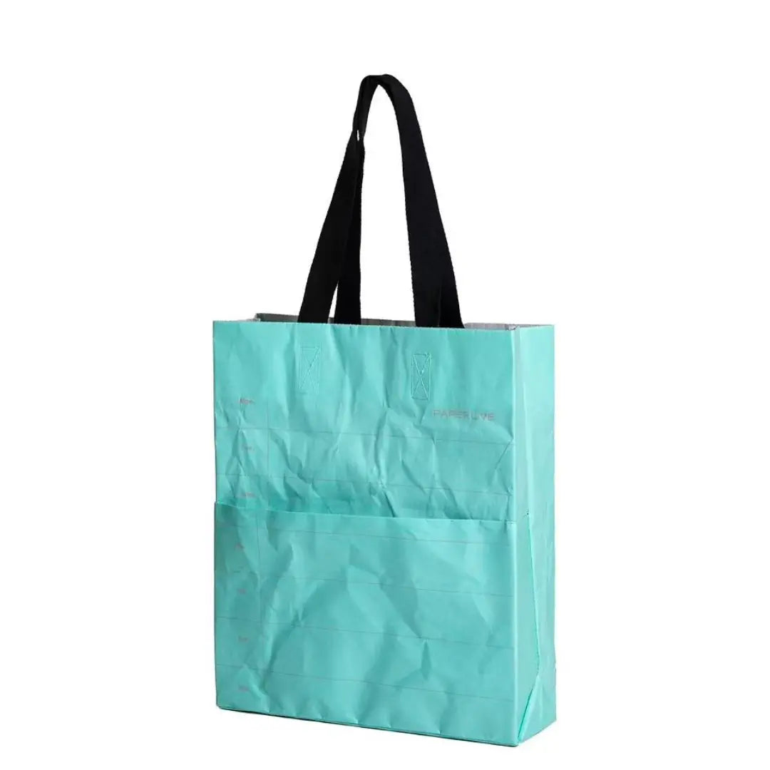 Blue washable paper tote bag for branded merchandise.