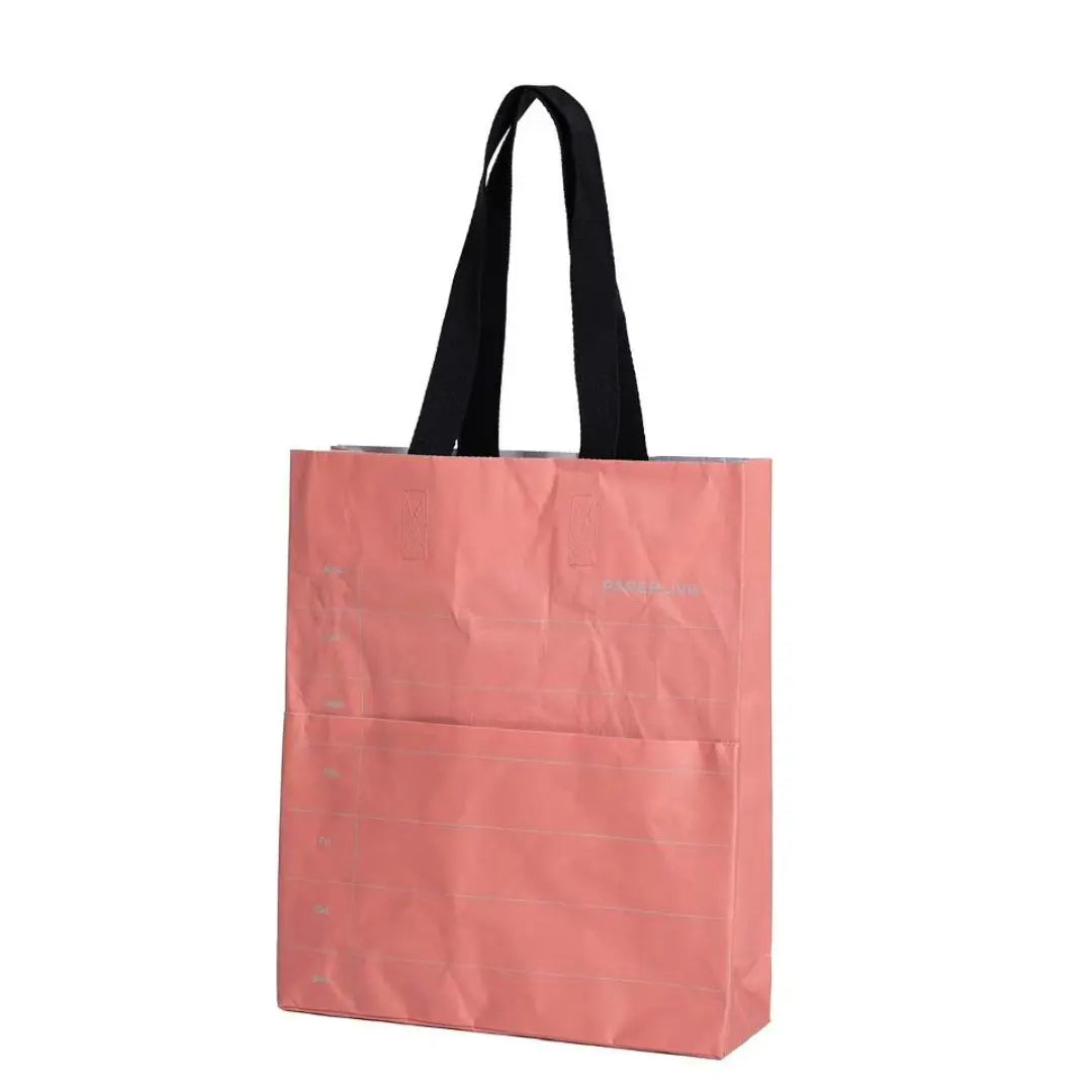 Pink washable paper tote bag with a leather-like look.